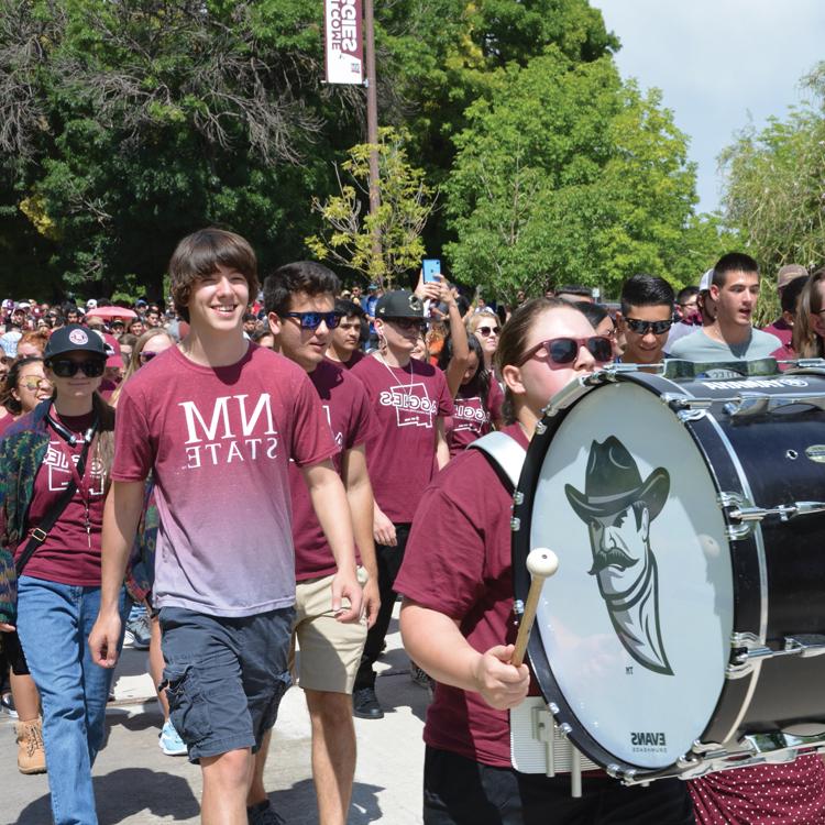 Students walking down the international mall during the First Walk event.